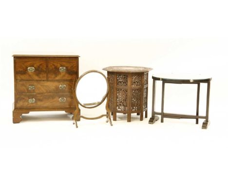 An octagonal table, standing on folding base, a Chinese folding table and an antique style toilet mirror, and a box commode