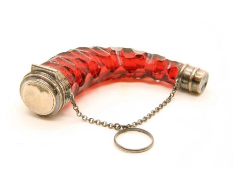 A novelty 'horn' ruby glass scent bottle , with white metal mounts, 9cm long