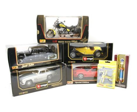 A collection of diecast 1:18 scale model cars, including a Burago Excel Ferrari F50, a Maisto Special Edition Ferrari, 550 Ma