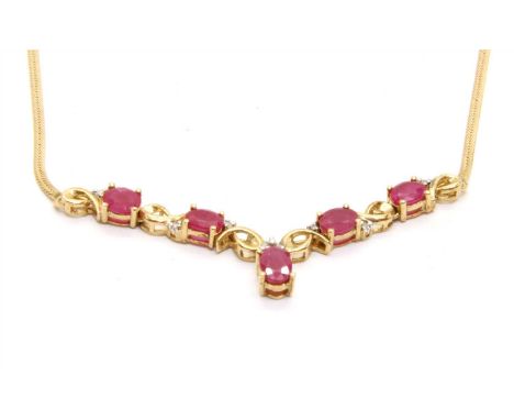 A 9ct gold ruby and diamond wishbone necklace, 4.60g