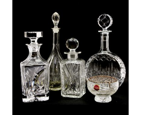 A collection of crystal glass decanters, to include a Victorian example and two boxed crystal pieces