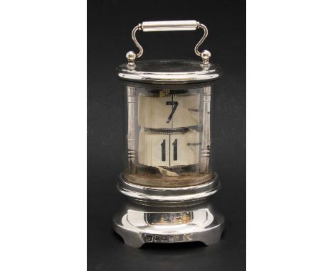 A silver 'Ticket-Clock' timepiece, By Charles S Green &amp; Co Ltd, Birmingham, 1904, the cylindrical case containing ivorene