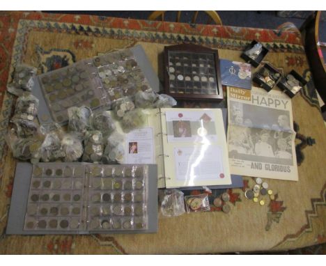 A large quantity of mixed coinage to include Commemorative Crowns and First Day Covers together with a quantity of mostly ear