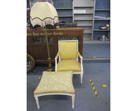 A French style white painted open armchair with gold coloured upholstery together with a matched square formed stool and an e