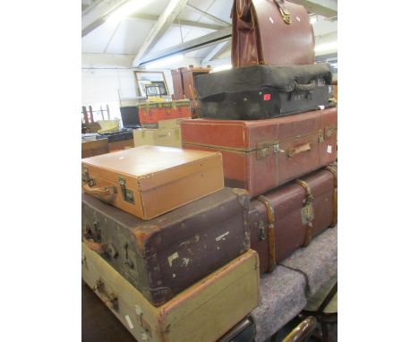 A vintage leatherette and bentwood bound trunk with internal Harrods label together with five other vintage cases, and a leat