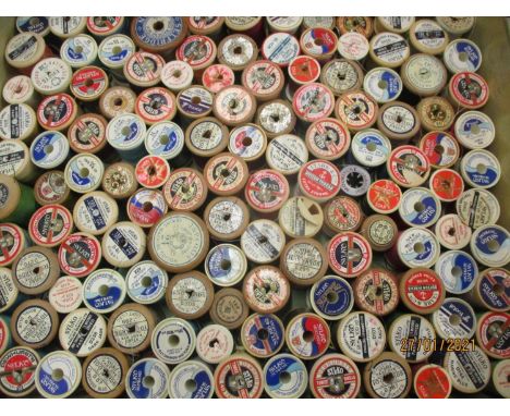 A large quantity of 20th century cotton reels to include mid 20th century Sylko wooden reels, J&amp;P Coats, Selfridge and Re
