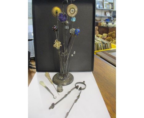 A silver stick pin holder and twelve stick/hat pins to include silver and enamelled examples together with other items 