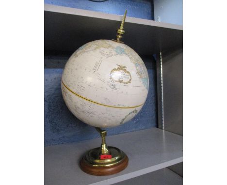 A Replogle 12" diameter World Classic series globe in cream on a brass and treen stand 