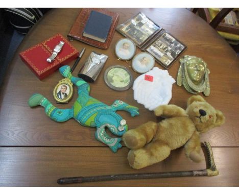 A mixed lot to include a vintage blonde teddy bear, a reproduction brass door knocker, a Parker pen, an empty Cartier box and