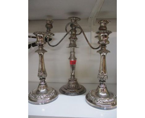 A pair of silver plated candlesticks A/F and a silver plated candelabra 