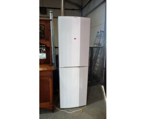 A Bosch fridge-freezer finished in white enamel. Ex house clearance
