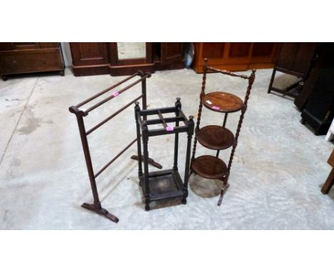An oak 3 tier cake stand, an airer and a stick stand