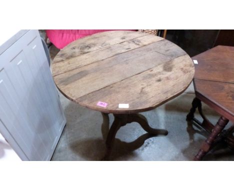 An oak tripod table 29'' diameter and a pine long stool 54'' long