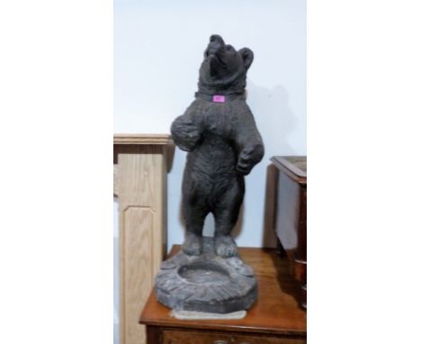A composition bear stick stand. 36'' high