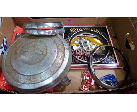 Automobilia to include an Austin hubcap, four headlamp bezels etc.