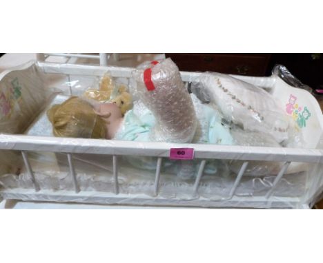 A collectors doll 'Baby's First Year' with cot. Boxed