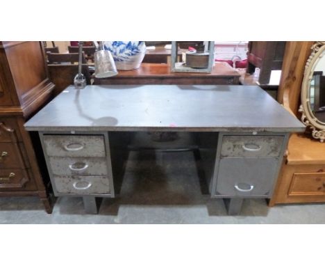 A steel 'industrial' office desk with fitted angled lamp. 60'' wide