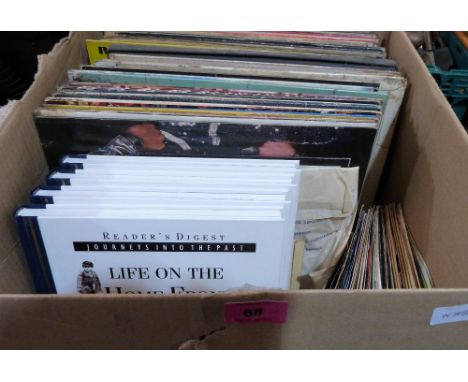 A box of long playing vinyl records