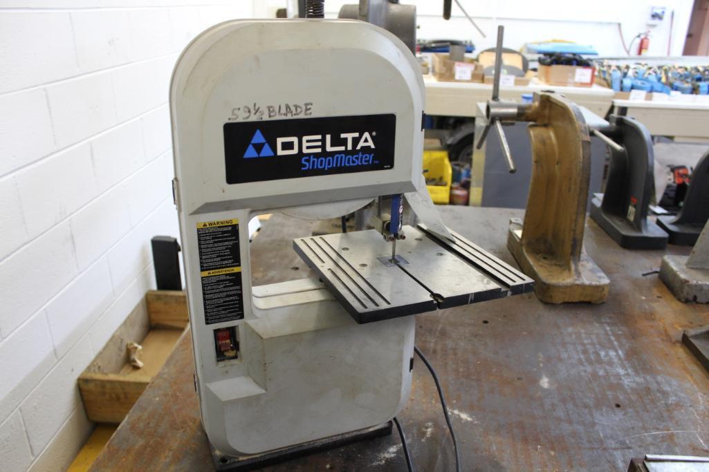 Delta BS 100 bench top band saw Location 1 Concord, NC. Lots 1299 at