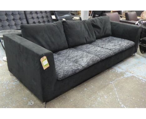 LIGNE ROSET SOFA, black with patterned cushions on metal supports, 95cm x 230cm. 