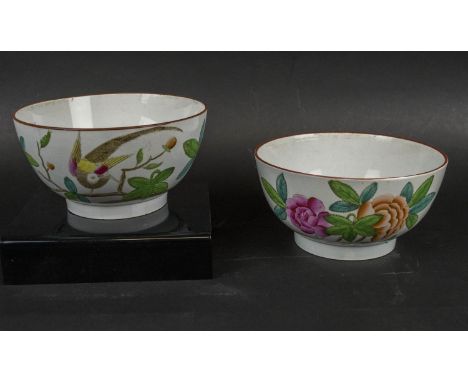 BOWLS, a pair, 18th/19th century cream ware, possibly Spode, decorated with perched bird and bright pink and green foliate, 1