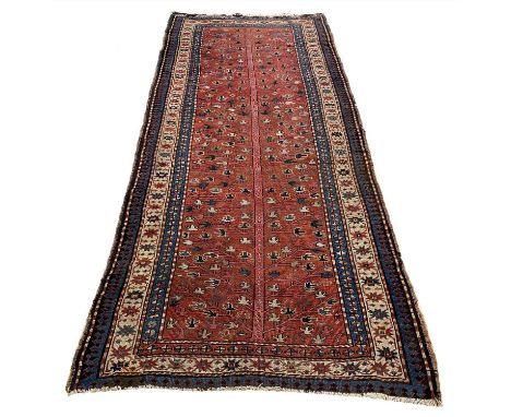 ANTIQUE CAUCASIAN RUNNER, 275cm x 116cm, 19th century. 