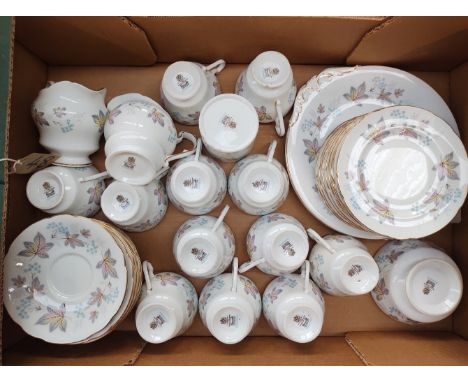 A box of Paragon china tea wares a box of Wellington china tea wares.