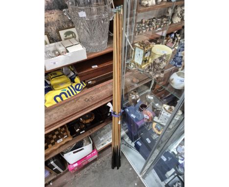 Nine snooker cues, various makers.Condition:- General wear with one tip missing and some small chips throughout.Dimensions:- 