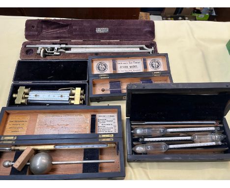 Five various scientific instruments in cases, 19th and early 20th century.