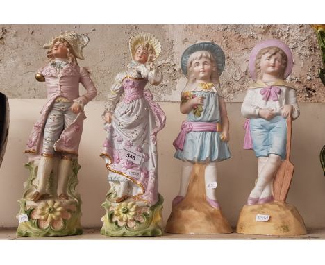Two pairs of Continental bisque figures. 
