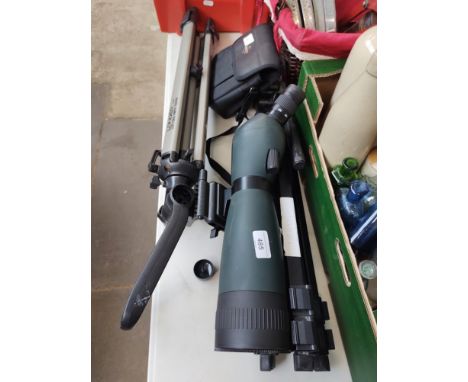 A pair of Swiss binoculars, 8 x 42, 2 camera tripods, and a Ipro Optigra field scope