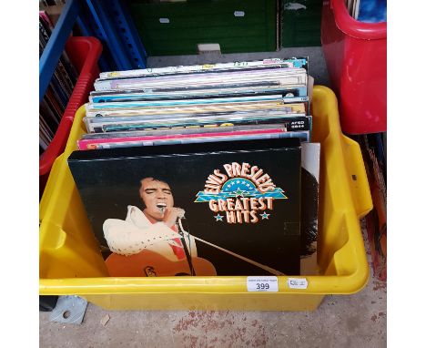 A box of assorted vinyl records to include Elvis Presleys greatest hits box set, Johnny Cash, Blow Monkeys, David Cassidy, T-