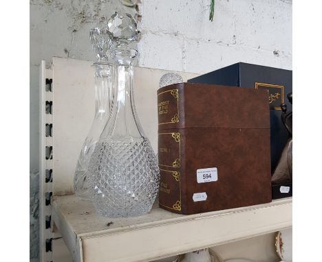 Four glass dencate4rs including a boxed History of World decanter with two glasses.