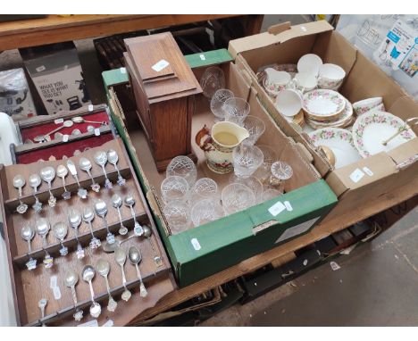 A box of Colclough tea wares, a box of glass, a mantle clock,  and a 3 racks of collectors spoons