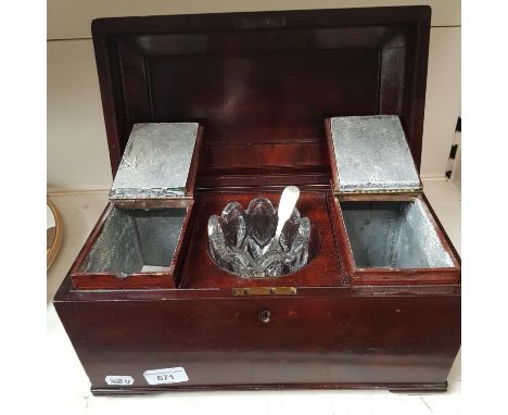 A 19th century mahogany tea caddy. Condition- there are some chips and surface marks, glass mixing bowl doesn't appear to be 