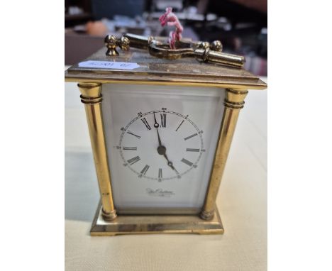 A Du Chateau brass carriage clock with key. 