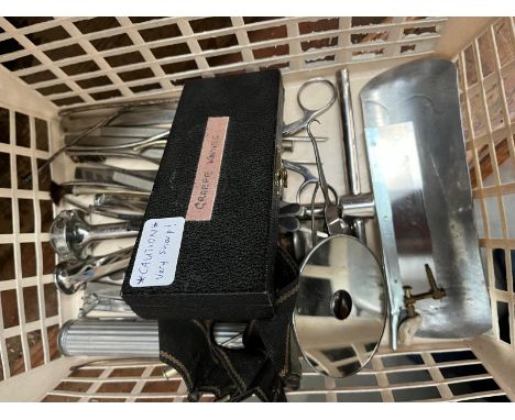 A box of medical instruments including Graefe knives, bone chisels, saw, etc.