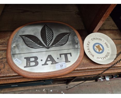 British American Tobacco sign and ash tray.