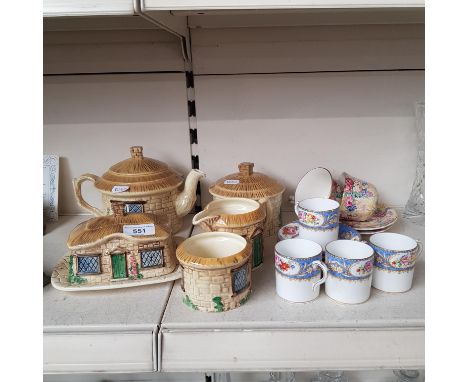 Sylvac cottage wares, 5 items including teapot, milk jug and sugar basin, together with a pair of Royal Winton chintz cups &a