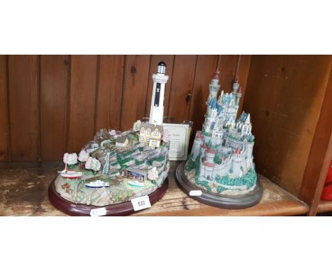 2 large Lenox models - Light at Spring Harbor (with COA) and Falkenstein.  Both have wooden bases and are approximately 27cm 