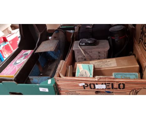 2 boxes to include a vintage tin plate Triang Express engine, a dolls rocking crib, vintage shoe stretcher kit, cameras and p