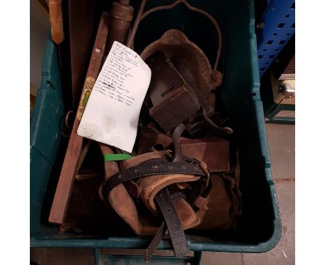 A box of vintage tools including planes, spirit levels, grease gun, boot pullers etc