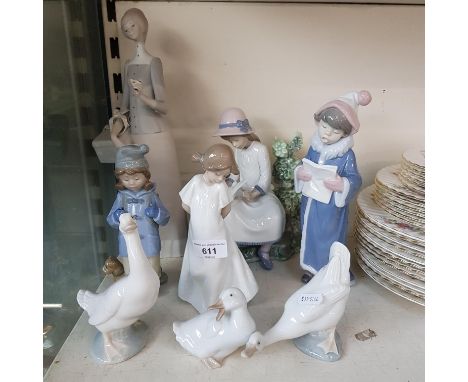 8 items of Lladro &amp; Nao - Lladro unusual figurine The Christmas Caroller (no.6533) by Juan Huerta, produced 1988-2000, Ll