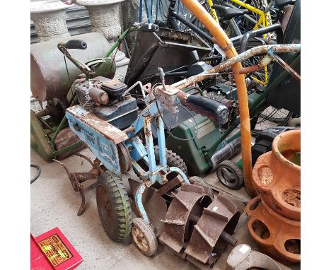A Templar Tiller rotavator with tractor wheels and plough (as found). 