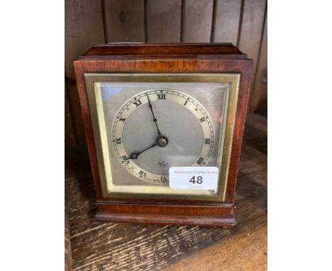 An Elliot mahogany mantle clock. 