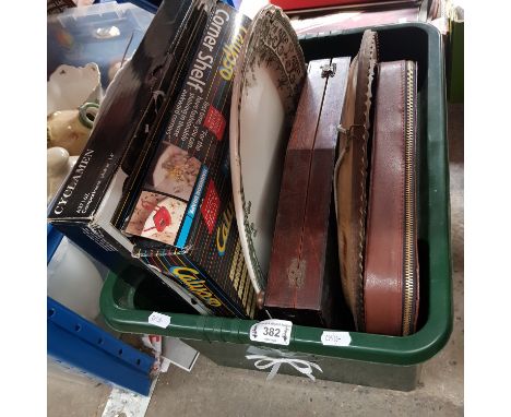A box containing plates, corner shelf, wooden hanging platter, canteen of cutlery, mahjong set etc