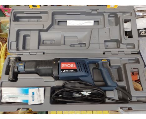 A cased Ryobi reciprocating saw 