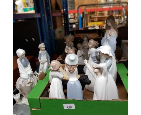 2 boxes of mainly Nao figurinrs (appx 14), 2 Lladro figures, and 2 labrador dog figures