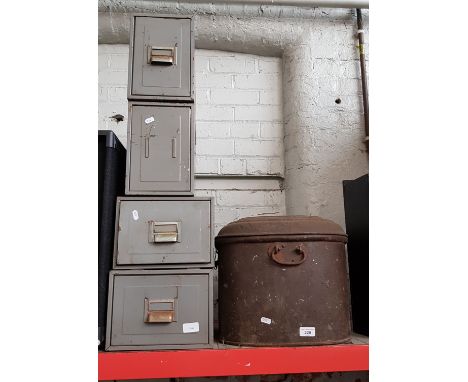 4 small metal drawers and a metal box with tools inside