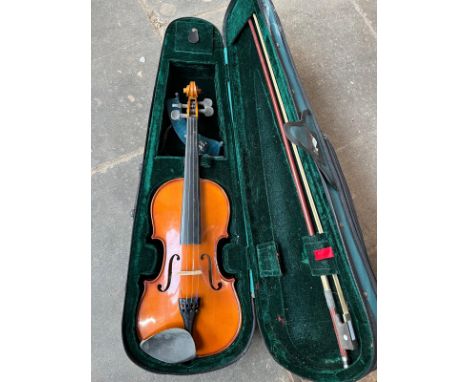 A Stentor Student ST violin in padded case 